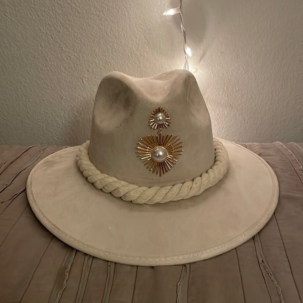 Never used! White cowboy hat with ivory gold embellishment! cute and stylish.
